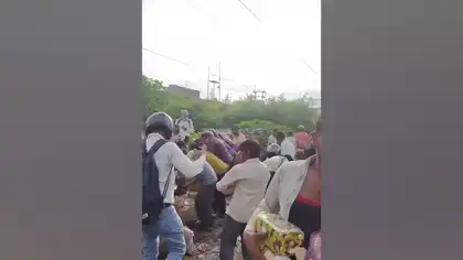 Crowd Rushes to Collect Expired Chocolates Near Garbage Dump in Kanpur