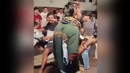Man Walks on Haridwar Streets With 7-Foot Python Around His Neck