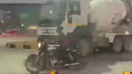 New Signal-Free U-Turn System Faces a Hurdle on Day One as Container Blocks the Way