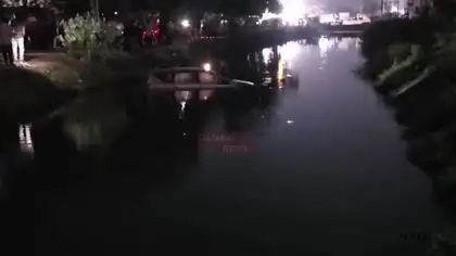 Innova Car Falls Into Canal in Ankleshwar After Handbrake Failure, Rescued by Crane Innova Car Falls Into Canal in Ankleshwar After Handbrake Failure, Rescued by Crane